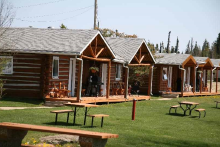 Log guest cabins at Christina Lake Lodge