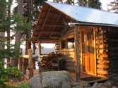 Log guest cabin at Caverhill Lodge