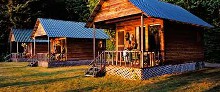 log guest cabins at Kimsquit Bay Lodge