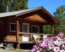 Housekeeping log guest cabin at Nechako Lodge