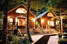 Night view of main lodge at Nimmo Bay Wilderness Resort