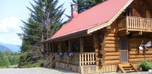 Log guest cabin at Pioneer Fishing Lodge
