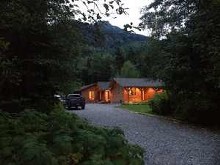 Evening view of guest cabins at Skeena River Lodge