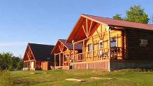 Log guest cabins at Arrow Lake Ranch