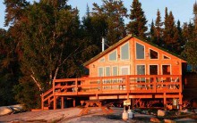 Large guest cabin with deck at Sasa-ginni-gak Lodge & Outcamps