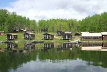 View of lake and cabins at Big Canon Lake Lodge