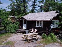 Camp Dore guest cabin in woods