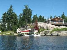 Float plane and cabin at Canada Outfitters