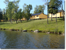 Cabins on lake at Gold Arrow Camp