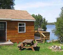 Guest cabin with lake view at Lost Lake Wilderness Lodge