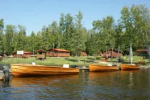 Boats and guest cabins at Meta Lake Lodge and Outpost Camps