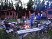 Guest cabins and firepit at North Caribou Camps