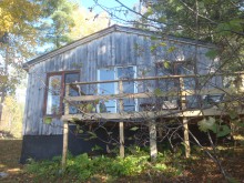 Guest cabin at Opimika Wilderness Camps & Cottages