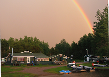 Procyk's Anglers Paradise Lodge with rainbow overhead