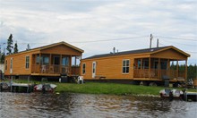 Lakefront cabins with boat docks at Savanne River Resort