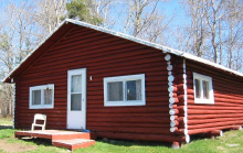 Log guest cabin at Seseganaga Lodge