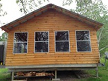 Guest cabin with TV and Wifi at Sunset Cove Resort