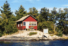 Guest cabin on rocky point at Whitefish Bay Camp