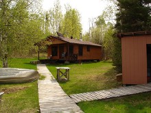 Outpost cabin with boat at Wilderness Air Escapes