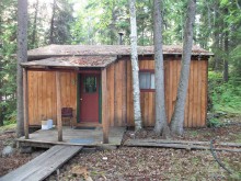 Rustic guest housekeeping cabin at Woman Lake Lodge