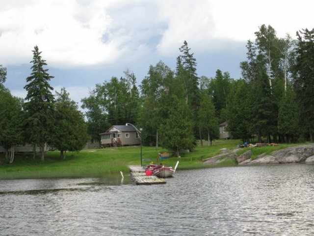 Guest cabin and dock at Camps Ronoda