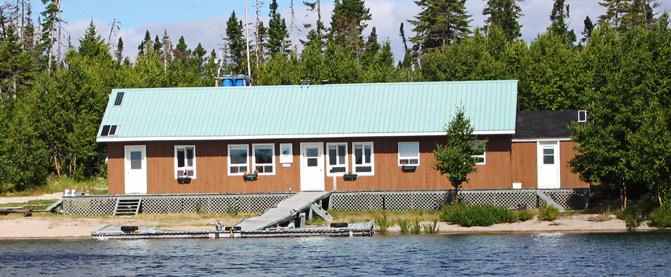 Waterfront main lodge at Lac Holt Fishing Lodge