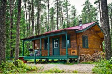 log guest cabin at Outfitter Lac Oscar