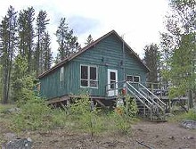 Log outpost cabin at Baptiste Lake Lodge
