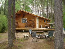 Housekeeping cabin with deck at Cup Lake Adventures