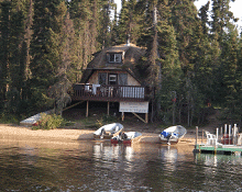 Riverfront cabin with fishing boats at Foster River Camps - Eulas Lake