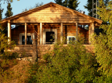 Log guest cabin at Reel North Outfitters Inc.