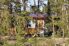 Guest cabin in the woods at Wilderness Family Outfitters