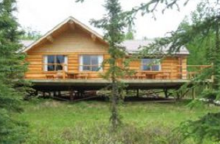 Log guest cabin at Grizzly Creek Lodge
